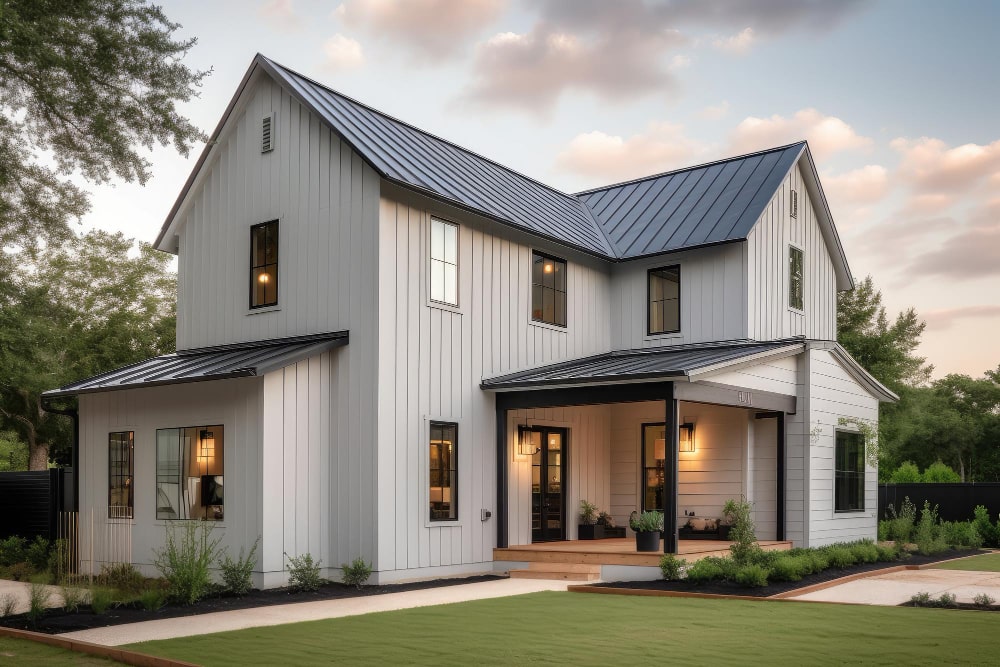 modern-farmhouse-with-shiplap-siding-gray-exterior-paint-surrounded-by-greenery-min